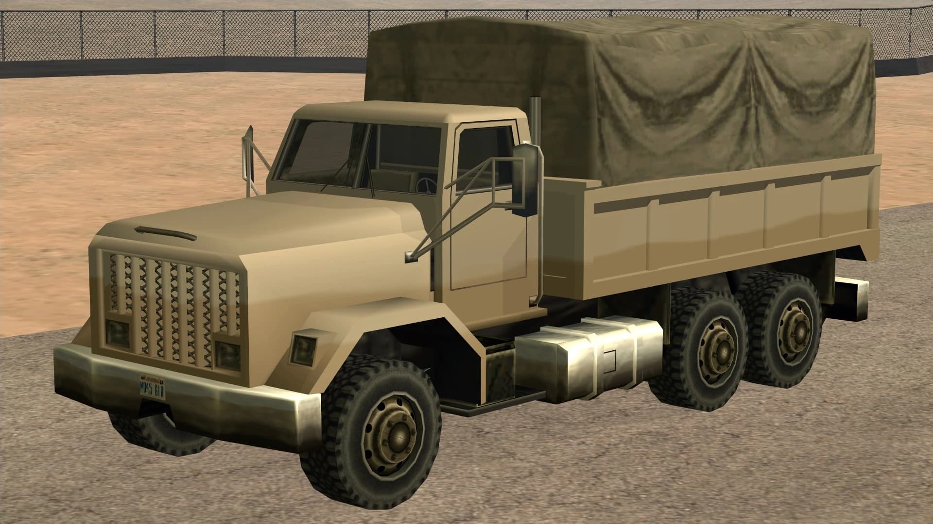 The Barracks OL, a canvas-topped six-wheeled army truck, front three-quarter view.