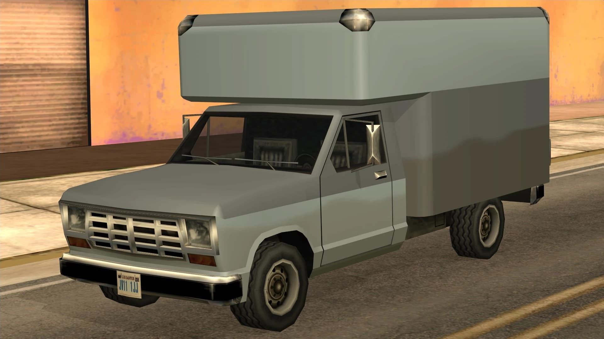 The Benson, a flat-fronted box-bodied delivery lorry, front three-quarter view.