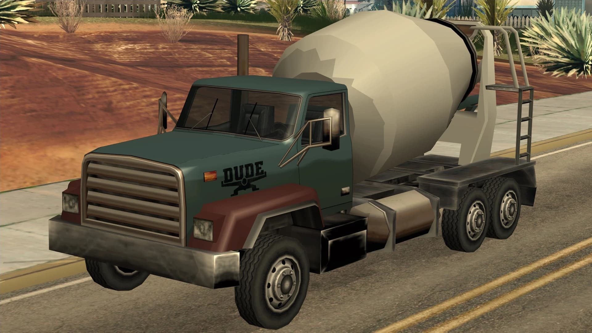 The Cement Truck, a mixer lorry with a rotating drum, front three-quarter view.