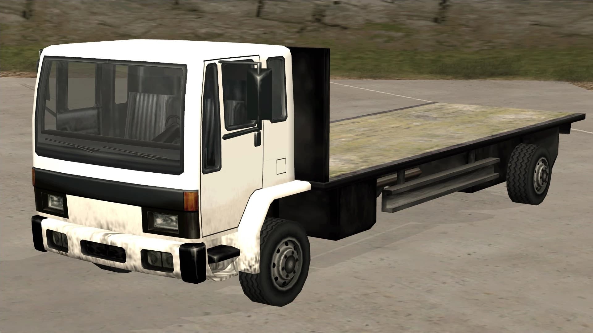 The DFT-30, a snub-nosed flatbed lorry, front three-quarter view.