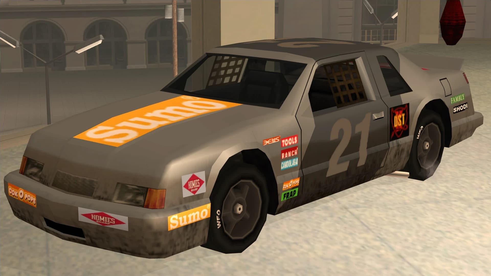 The Hotring Racer, a stock car in sponsor livery, front three-quarter view.
