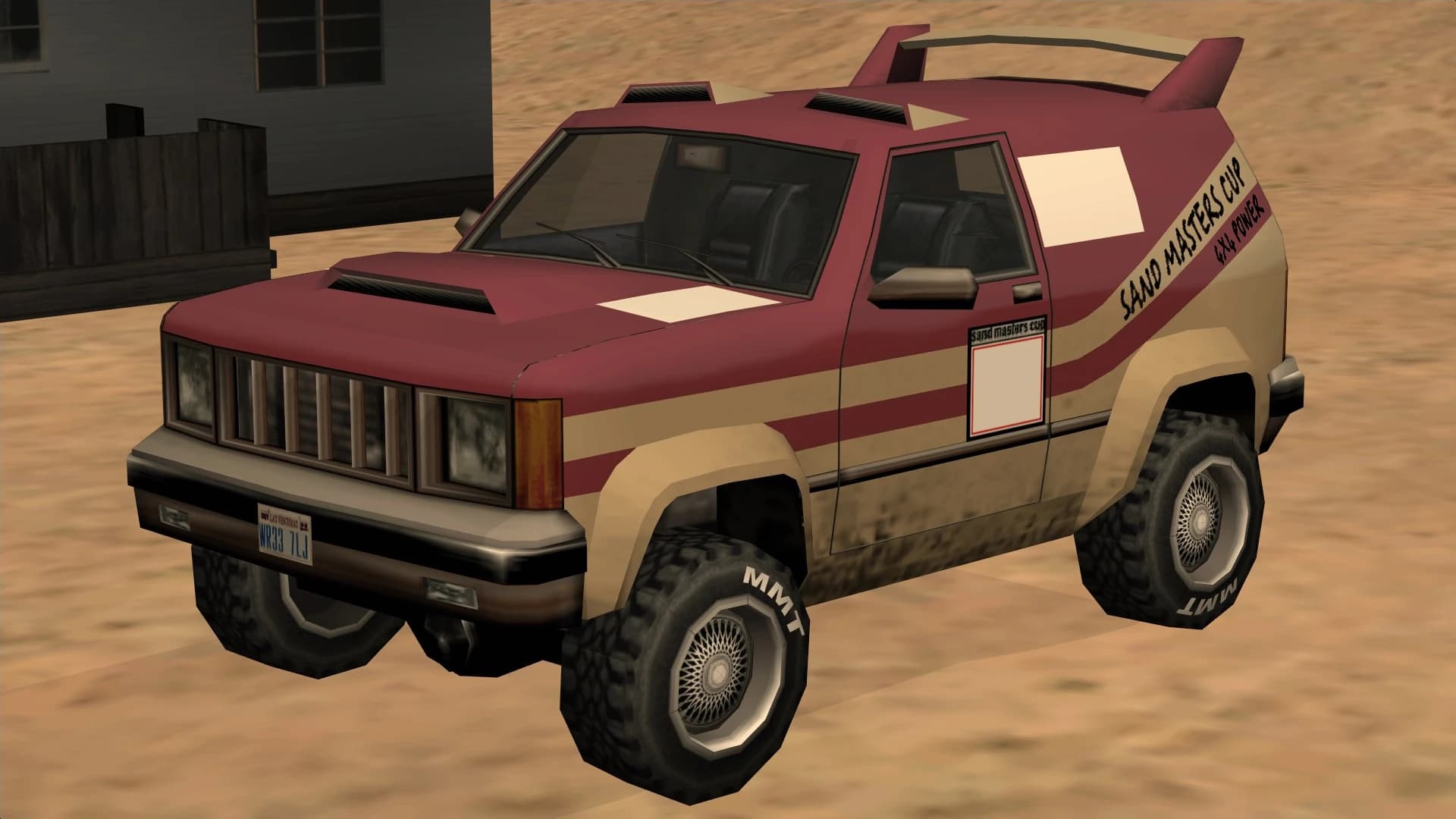 The Sandking, a pickup raised on tall off-road suspension, front three-quarter view.