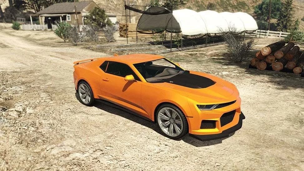 The Declasse Vigero ZX, an orange modern muscle coupe with a black bonnet, parked on a dirt yard, in GTA Online.