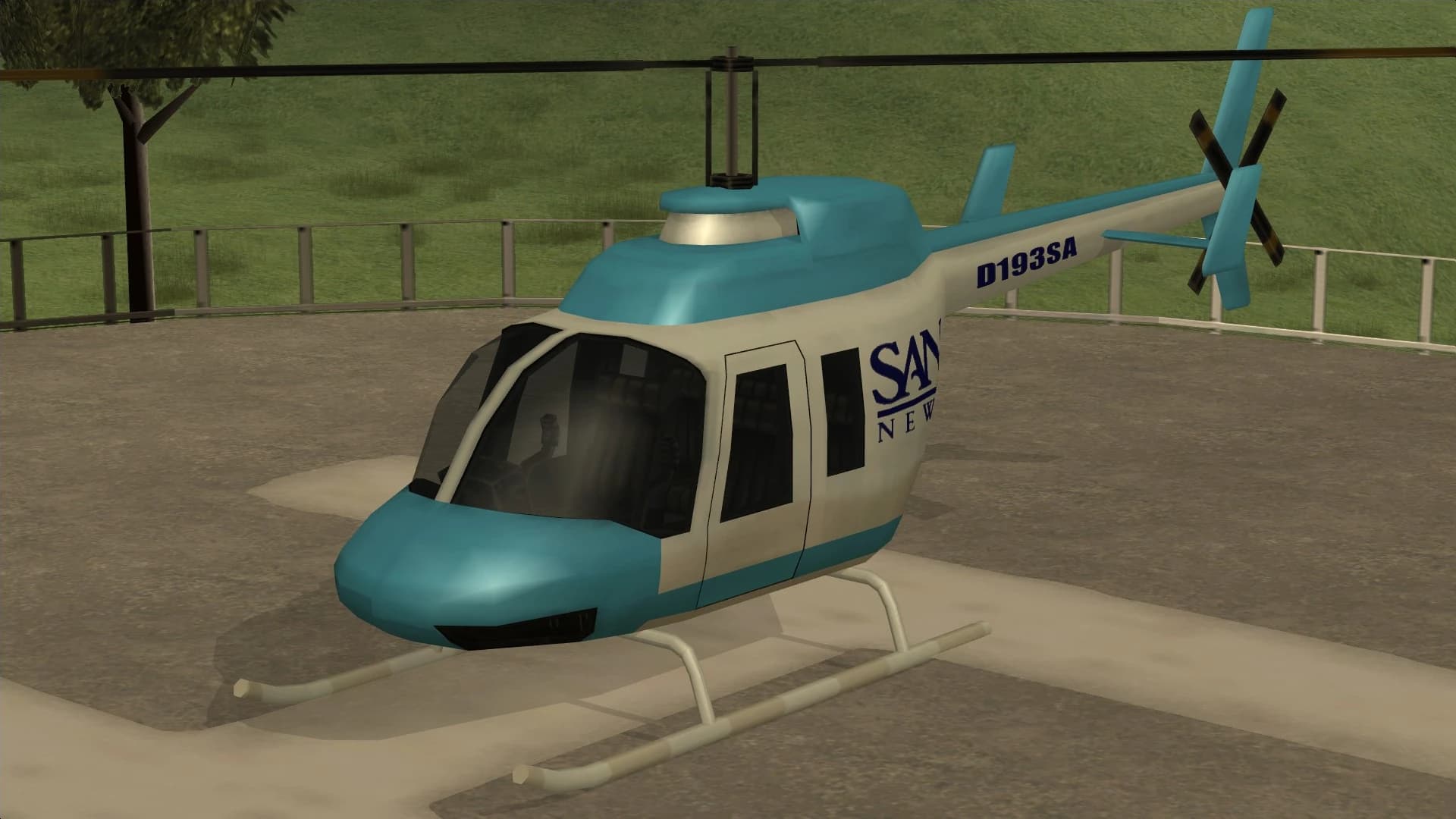 The News Chopper, a light helicopter in San Andreas news-station livery, on a helipad, front three-quarter view.