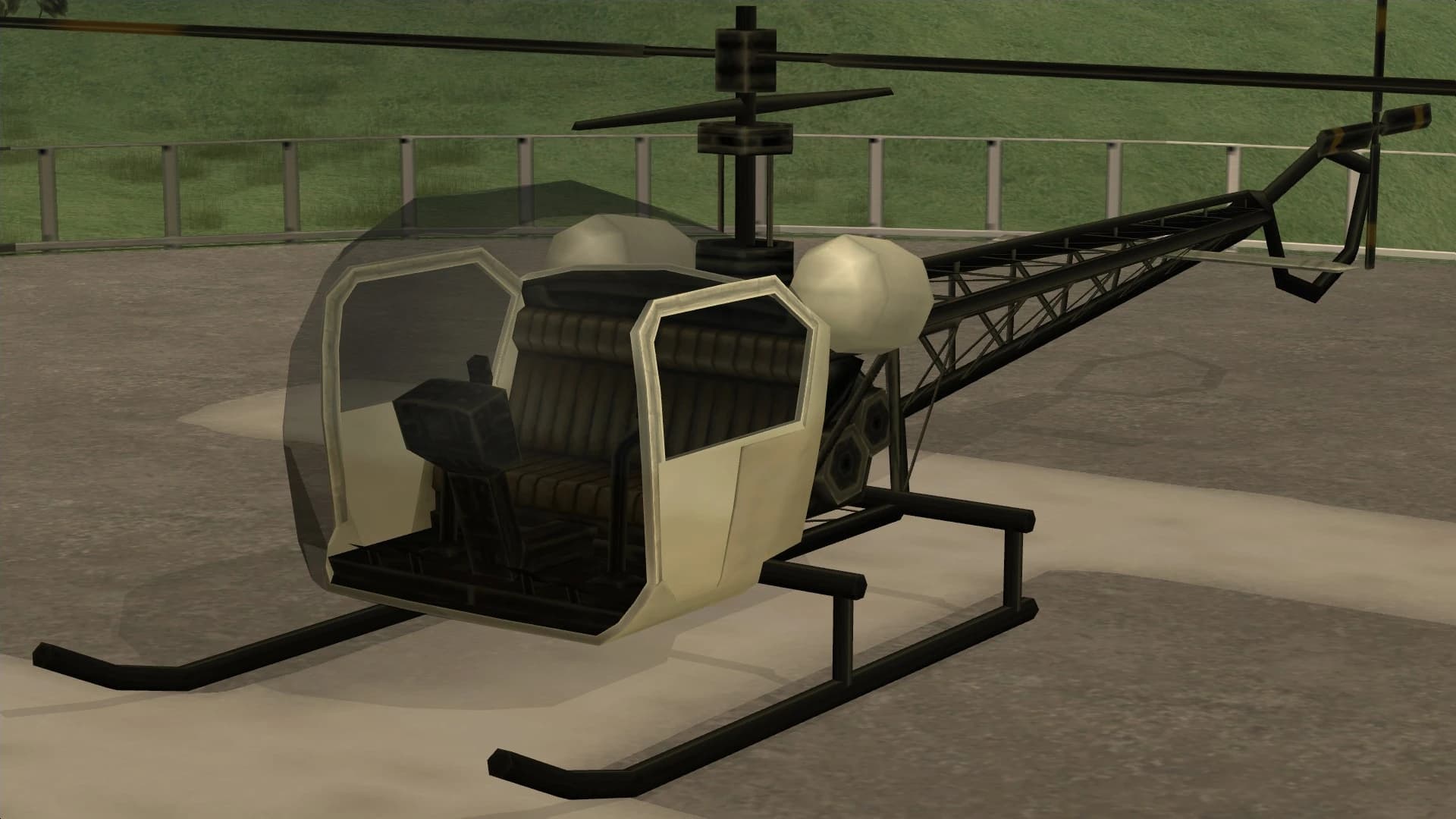 The Sparrow, a light bubble-canopy helicopter on a helipad, front three-quarter view.