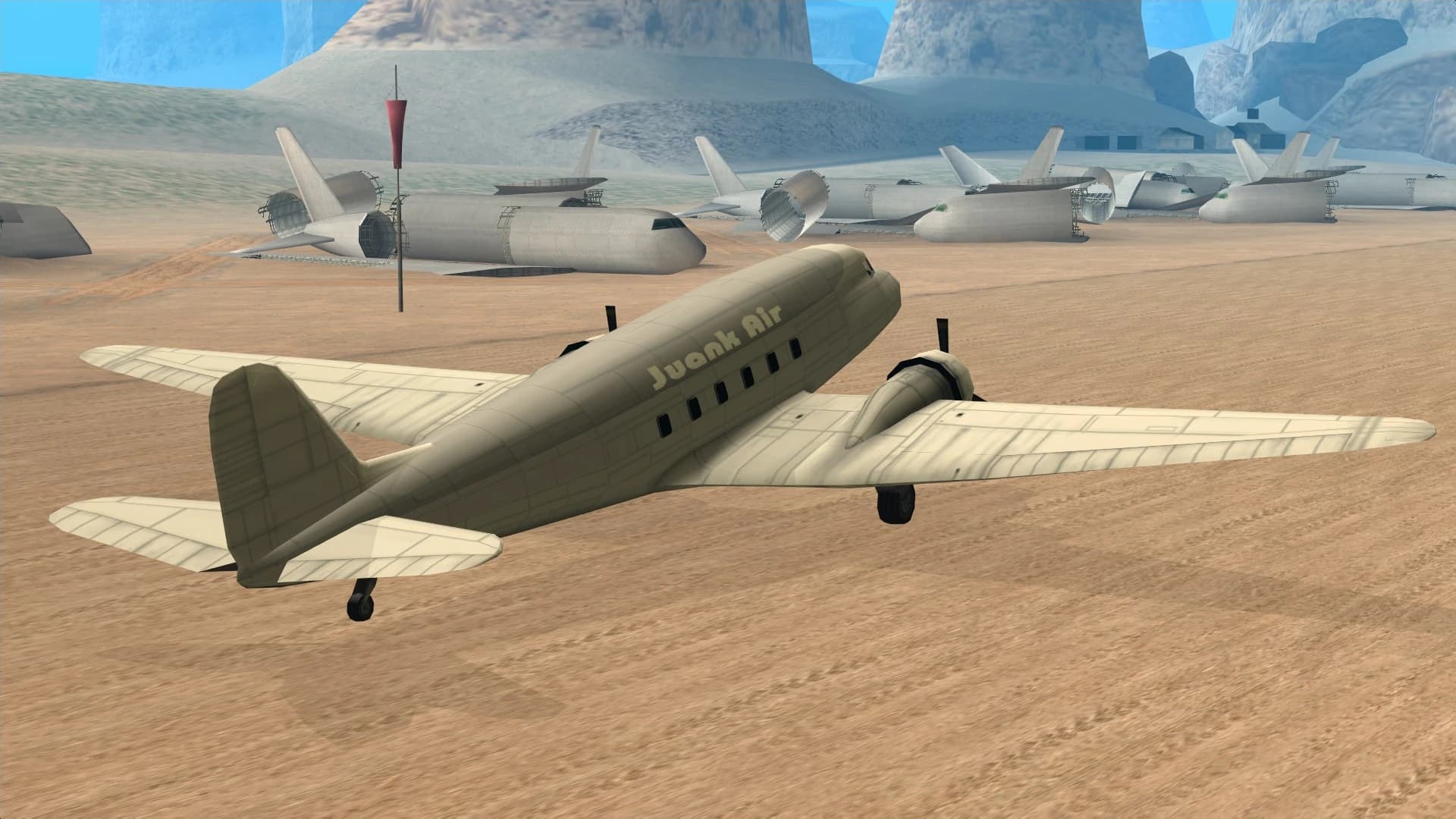 The Nevada, a twin-propeller cargo aircraft in Juank Air livery, rear three-quarter view.