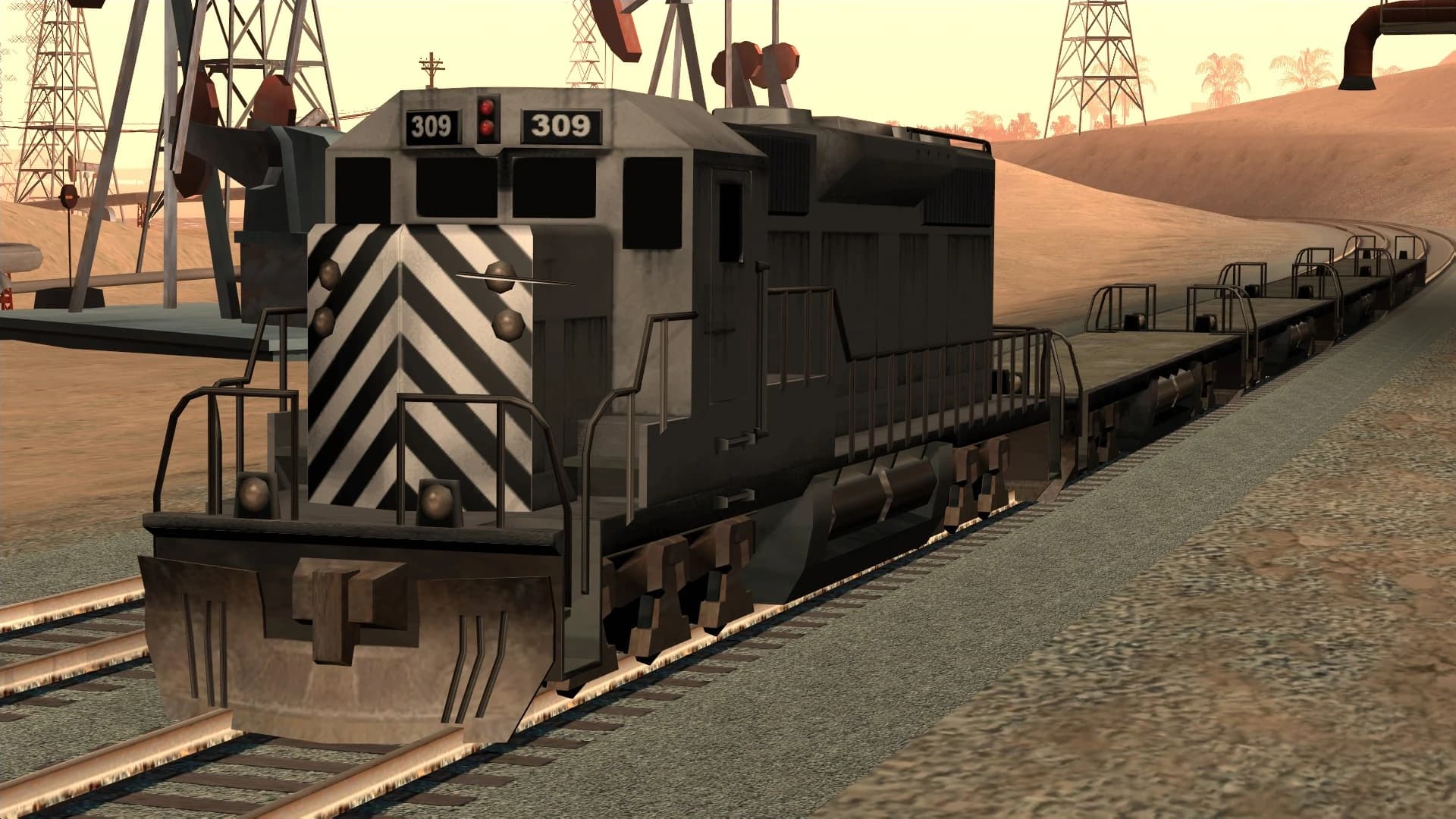 The Freight, a diesel freight locomotive with a striped nose, hauling flatbed wagons, front three-quarter view.