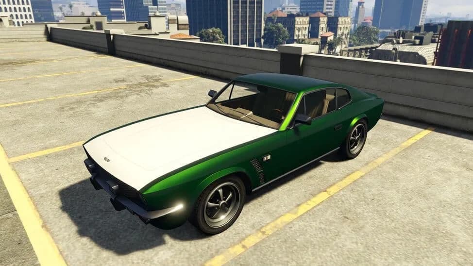 The Dewbauchee Rapid GT Classic, a green 1970s grand touring coupe with a white bonnet, parked on a rooftop car park, in GTA Online.