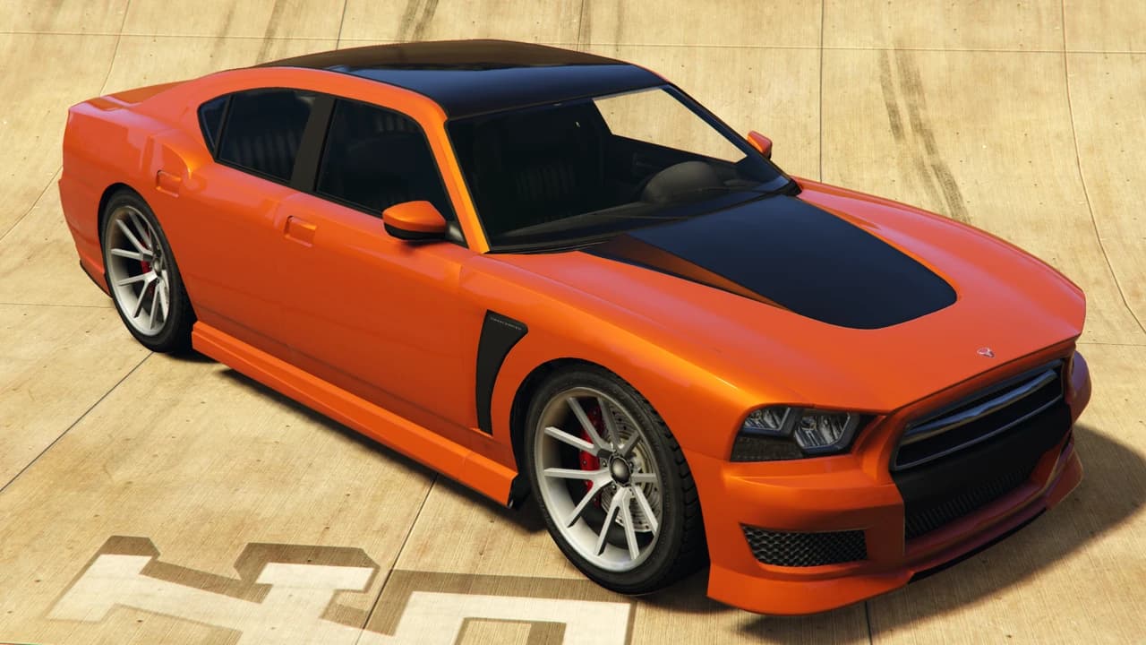 An orange Bravado Buffalo S with a black bonnet stripe, front three-quarter view.