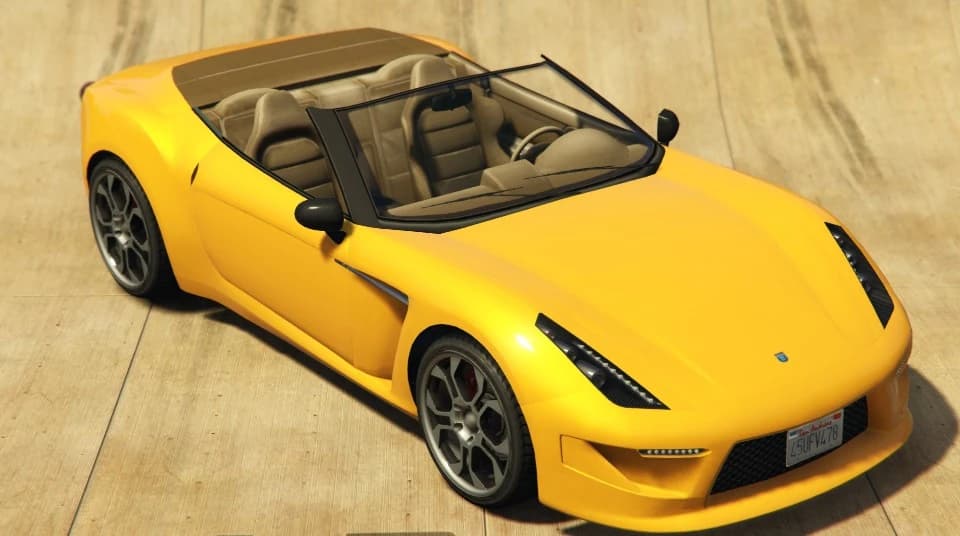 A yellow Grotti Carbonizzare with its roof down, front three-quarter view.
