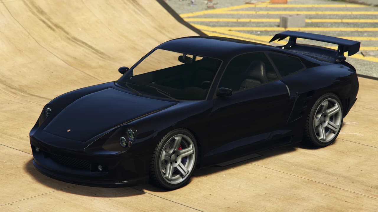 A dark navy Pfister Comet with a rear wing, front three-quarter view.