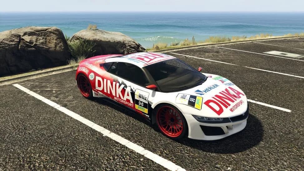 The Dinka Jester (Racecar), a white sports car in red Dinka motorsport livery, parked by the coast, in GTA Online.