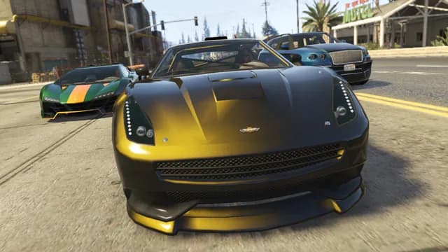 A black and gold Dewbauchee Massacro head-on in traffic, in GTA Online.