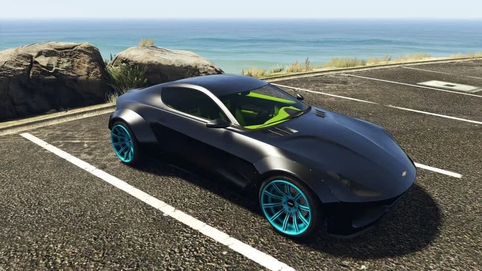 The Dewbauchee Specter Custom, a black widebody sports coupe on cyan wheels, parked by the coast, in GTA Online.