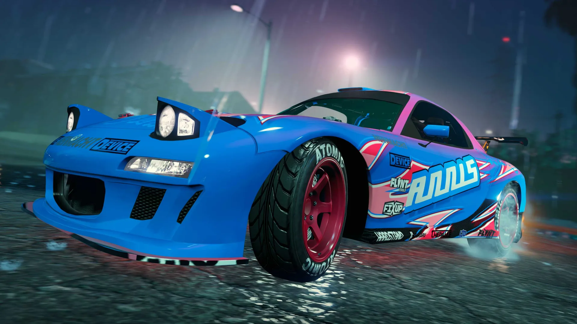 A blue Annis ZR350 with pop-up headlights and an Annis livery, drifting, in GTA Online.