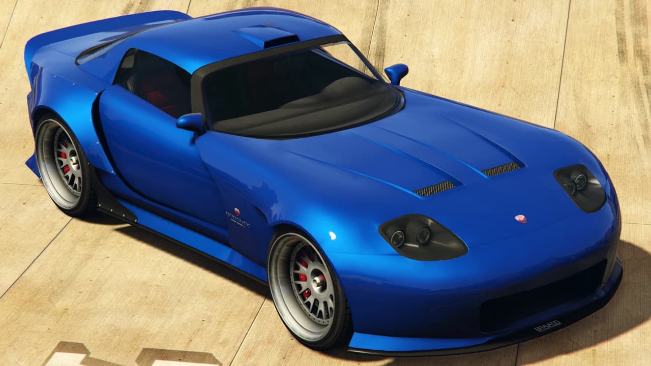 A blue Bravado Banshee 900R with bolt-on widebody arches and a roof scoop, front three-quarter view.