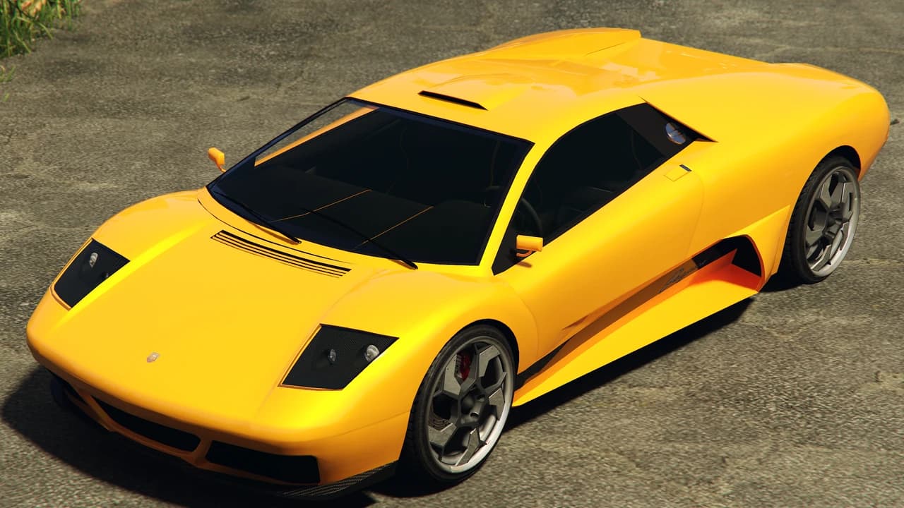 A yellow Pegassi Infernus parked on concrete.