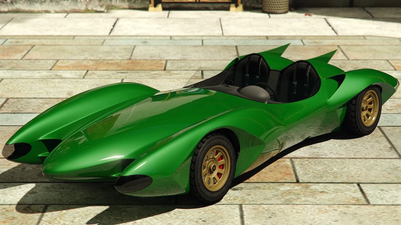 A green Declasse Scramjet with twin nose cones and an open cockpit, front three-quarter view.
