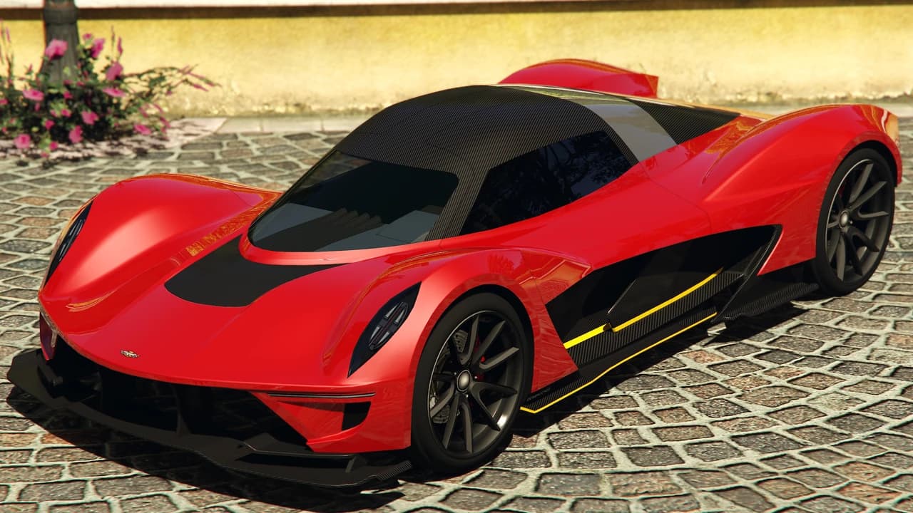 A red Dewbauchee Vagner with a black carbon roof, front three-quarter view.