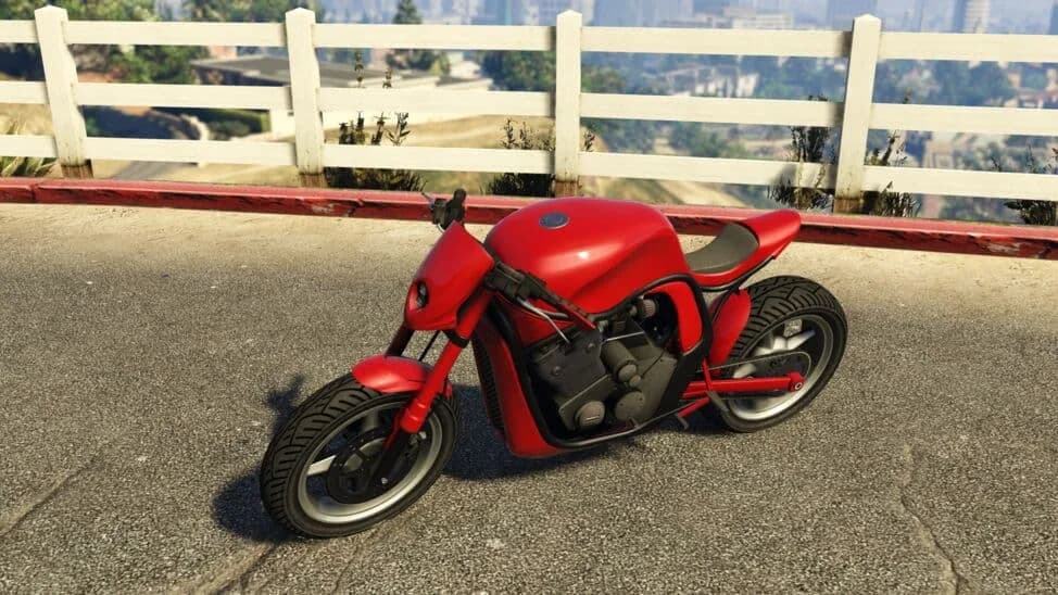 The Shitzu Defiler, a red naked muscle motorcycle, parked by a white fence, in GTA Online.