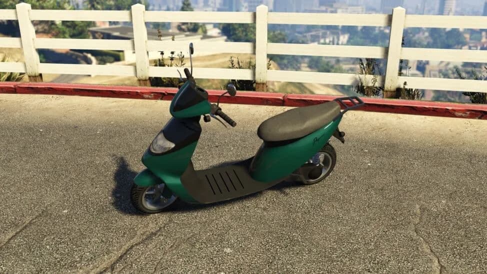 The Pegassi Faggio Sport, a green modern scooter, parked by a white fence, in GTA Online.