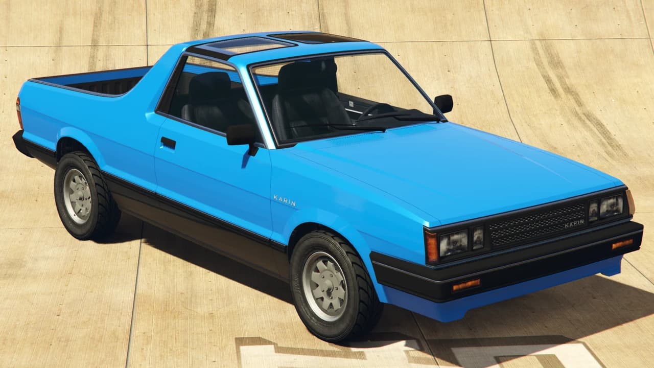 A blue Karin Boor coupe utility, front three-quarter view.