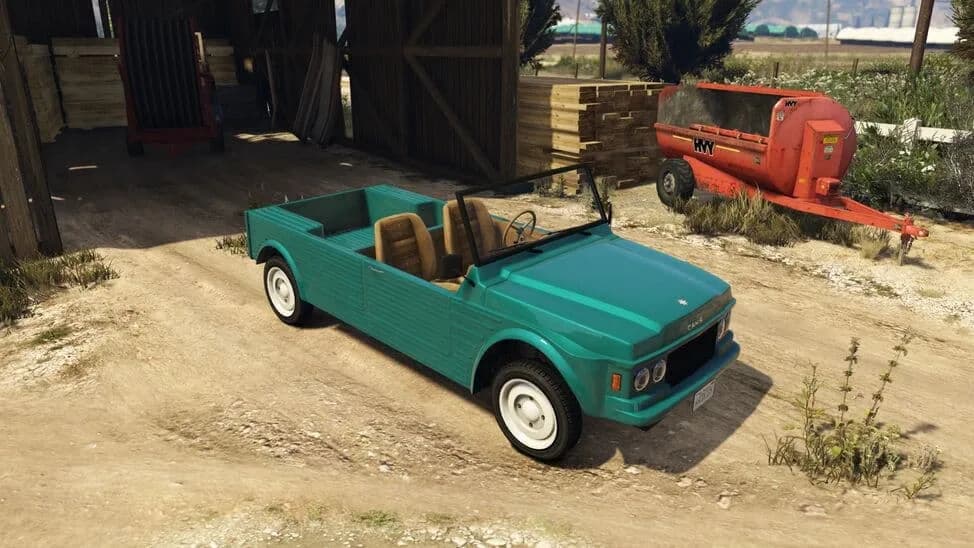 The Canis Kalahari, a teal open-top utility car, parked by a barn, in GTA Online.