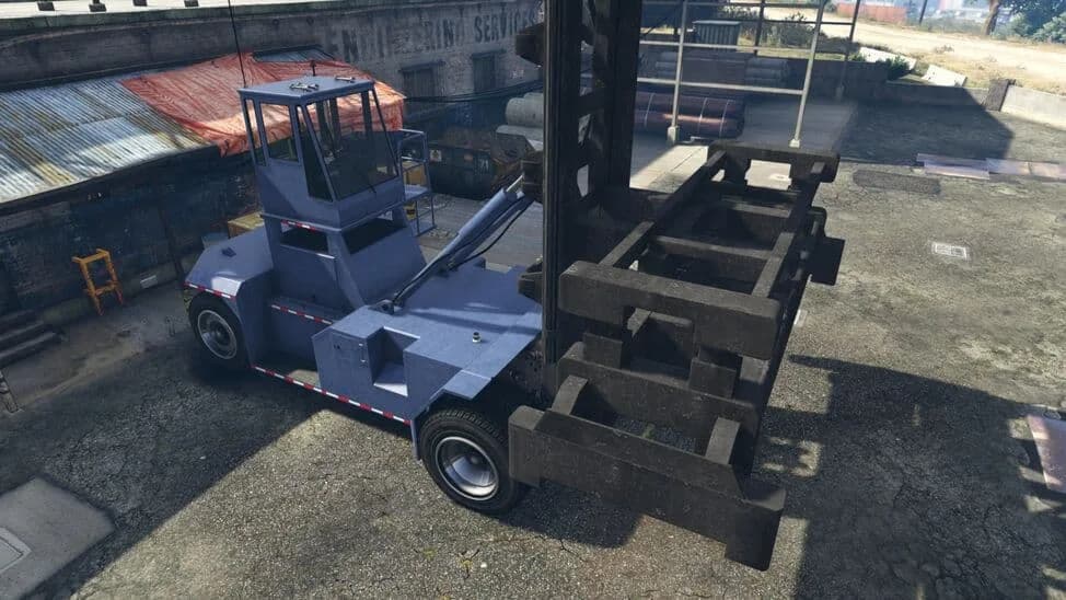 The Dock Handler, a blue container handler with a large lifting frame, parked in a dock yard, in GTA Online.