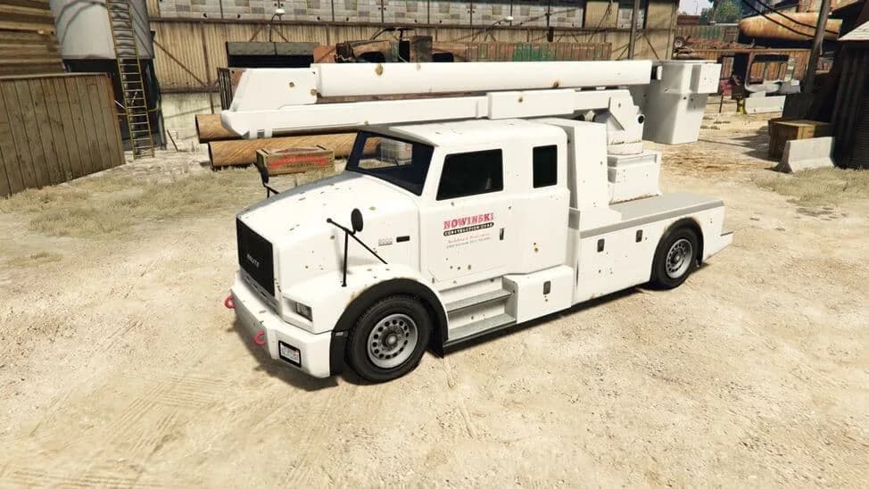 The Utility Truck (Crane), a white service truck with a bucket crane on its bed, parked in a yard, in GTA Online.