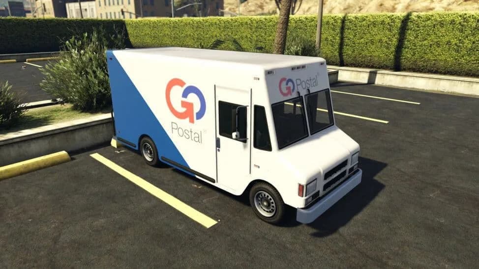 The Boxville, a white delivery step van in a postal livery, parked in a car park, in GTA Online.