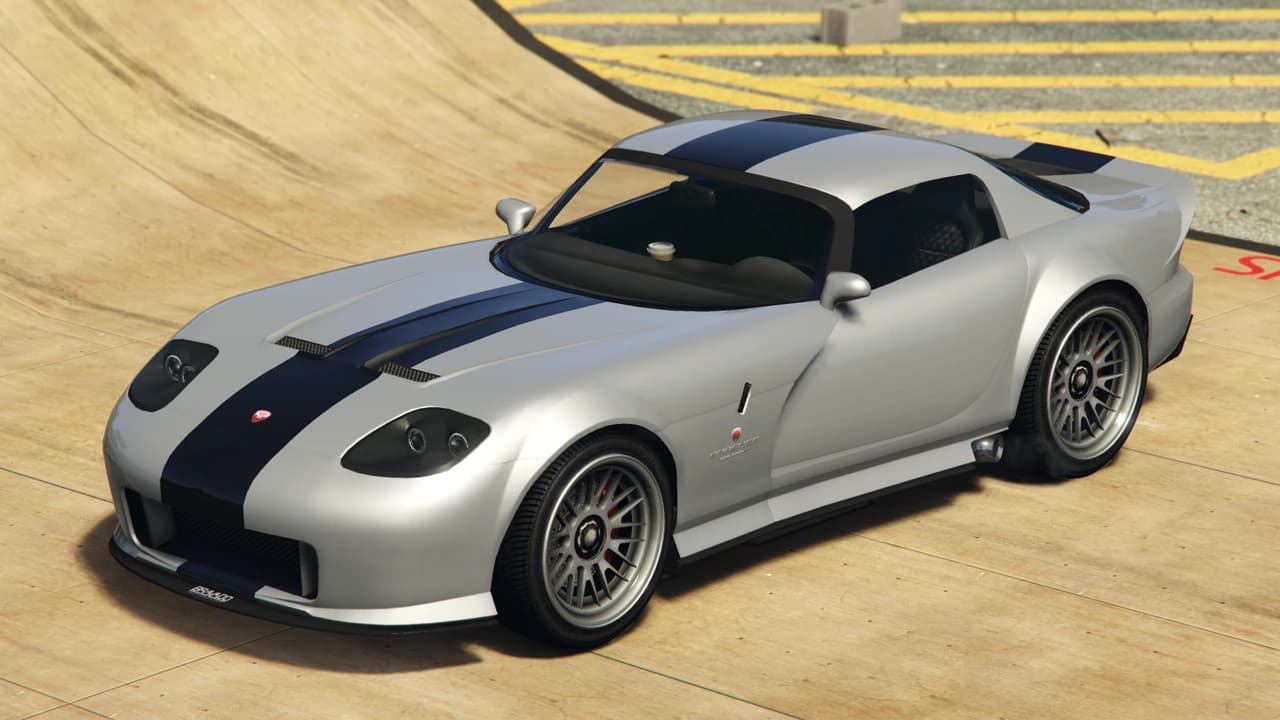 A silver Bravado Banshee with twin navy stripes over the bonnet and roof, front three-quarter view.