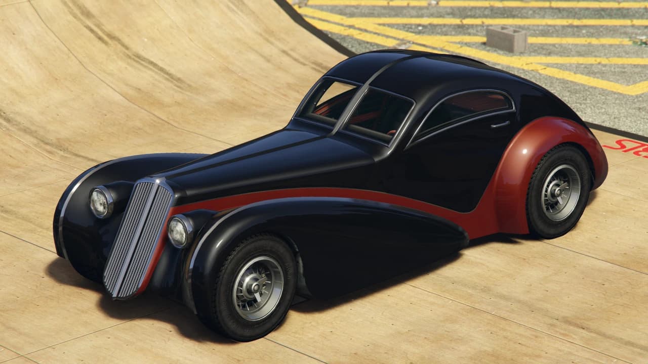 A black Truffade Z-Type with a maroon flash along the flank, front three-quarter view.
