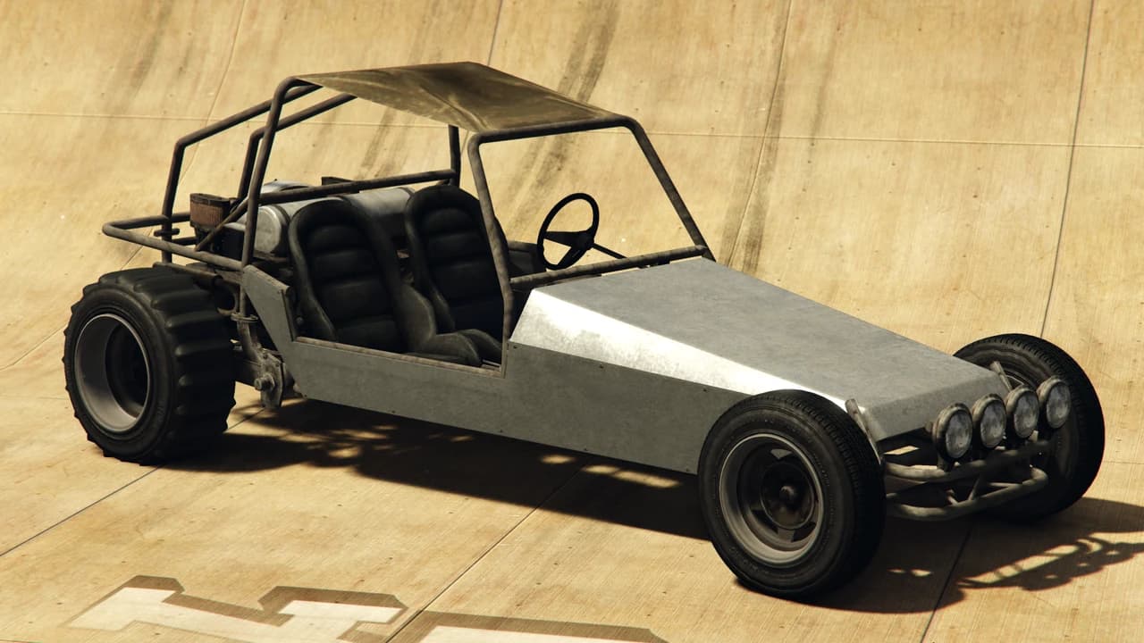 A bare-metal BF Dune Buggy with a roll cage and a canvas roof, front three-quarter view.