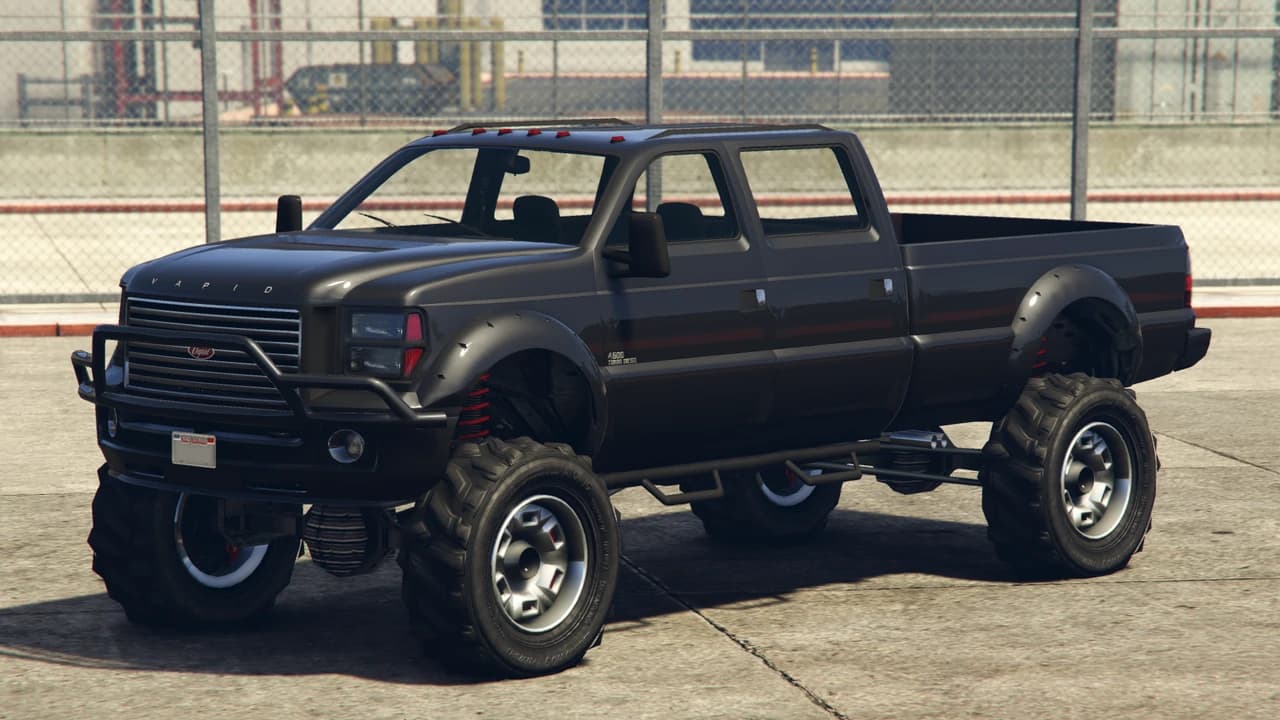A black Vapid Sandking XL with a crew cab and a long bed, front three-quarter view.