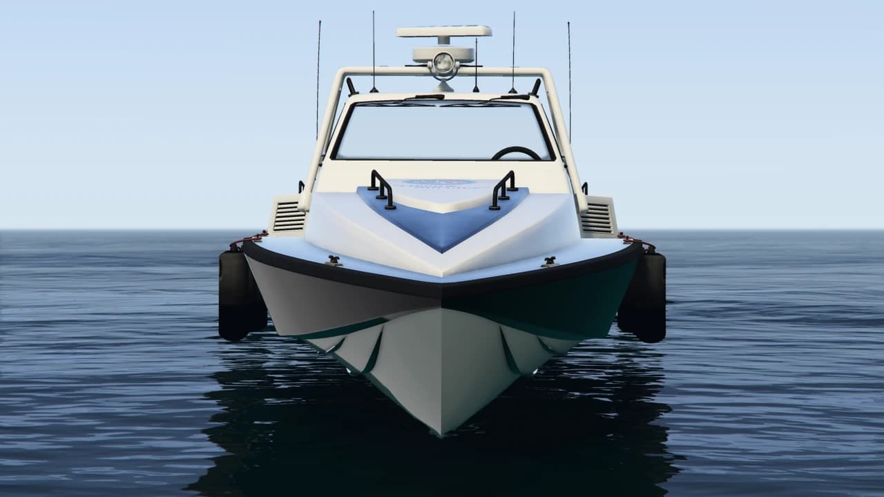 A white Police Predator patrol boat with a radar mast, head-on bow view.