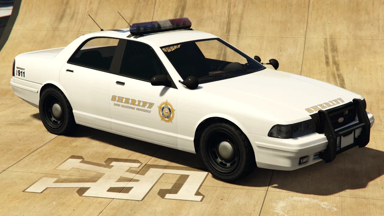 A white Sheriff Cruiser in Los Santos County livery with a push bar and roof light bar, front three-quarter view.
