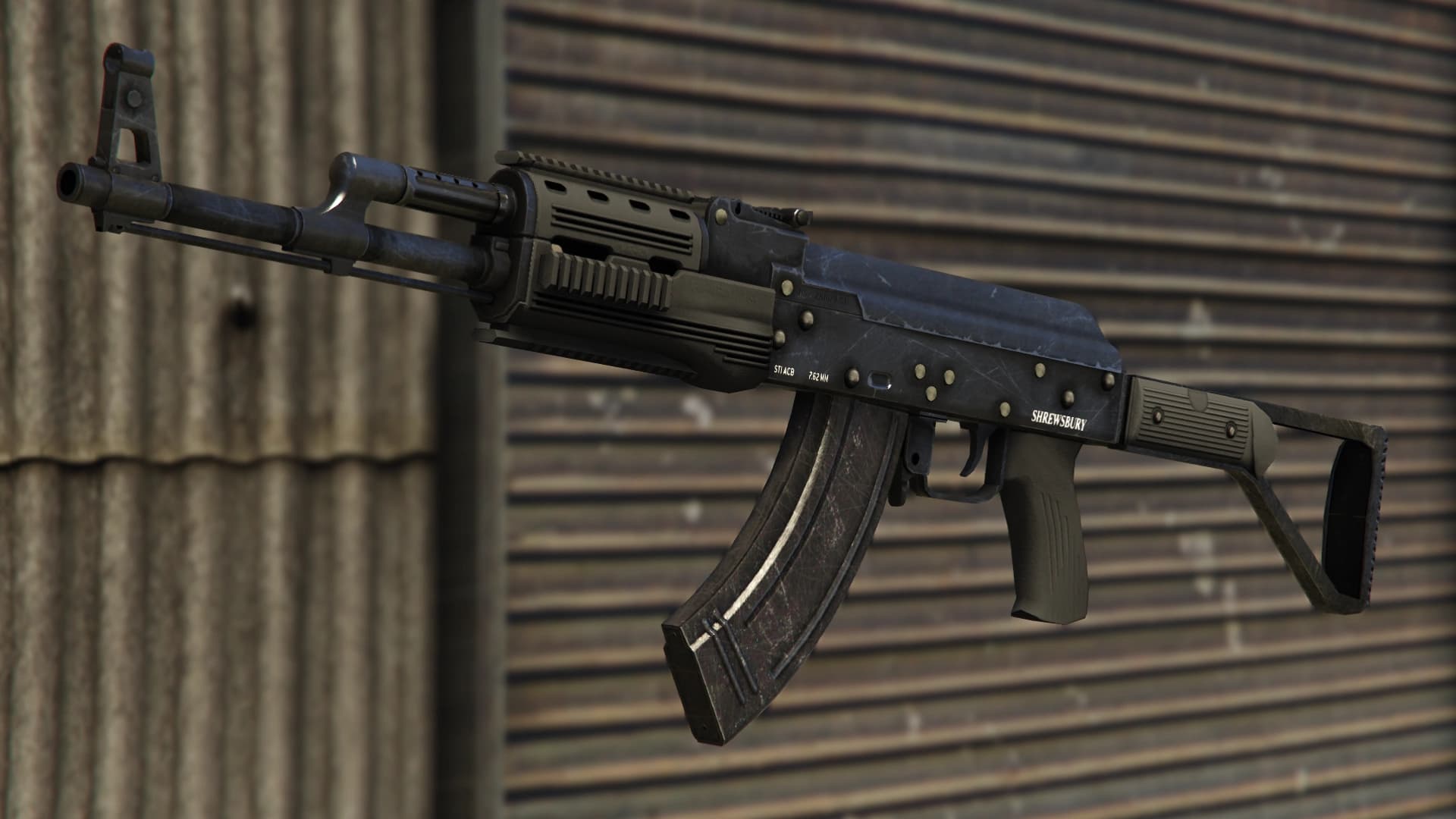 The GTA V Assault Rifle: a black polymer AK-pattern rifle stamped SHREWSBURY and 7.62MM, against a corrugated wall.